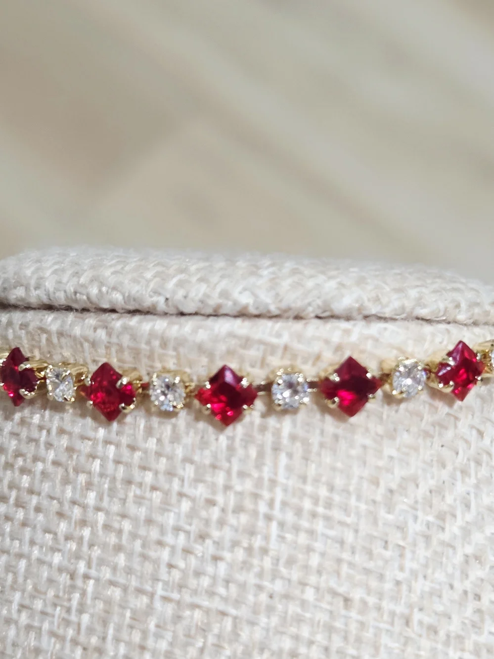 Gold-filled Bracelet with Red Gemstones and Clear Accents
